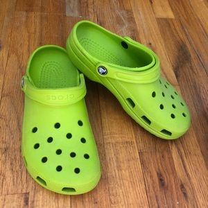 Green Classic Crocs, size 8.